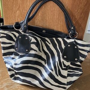 Chic Zebra Pattern Shoulder Bag with Black Trim